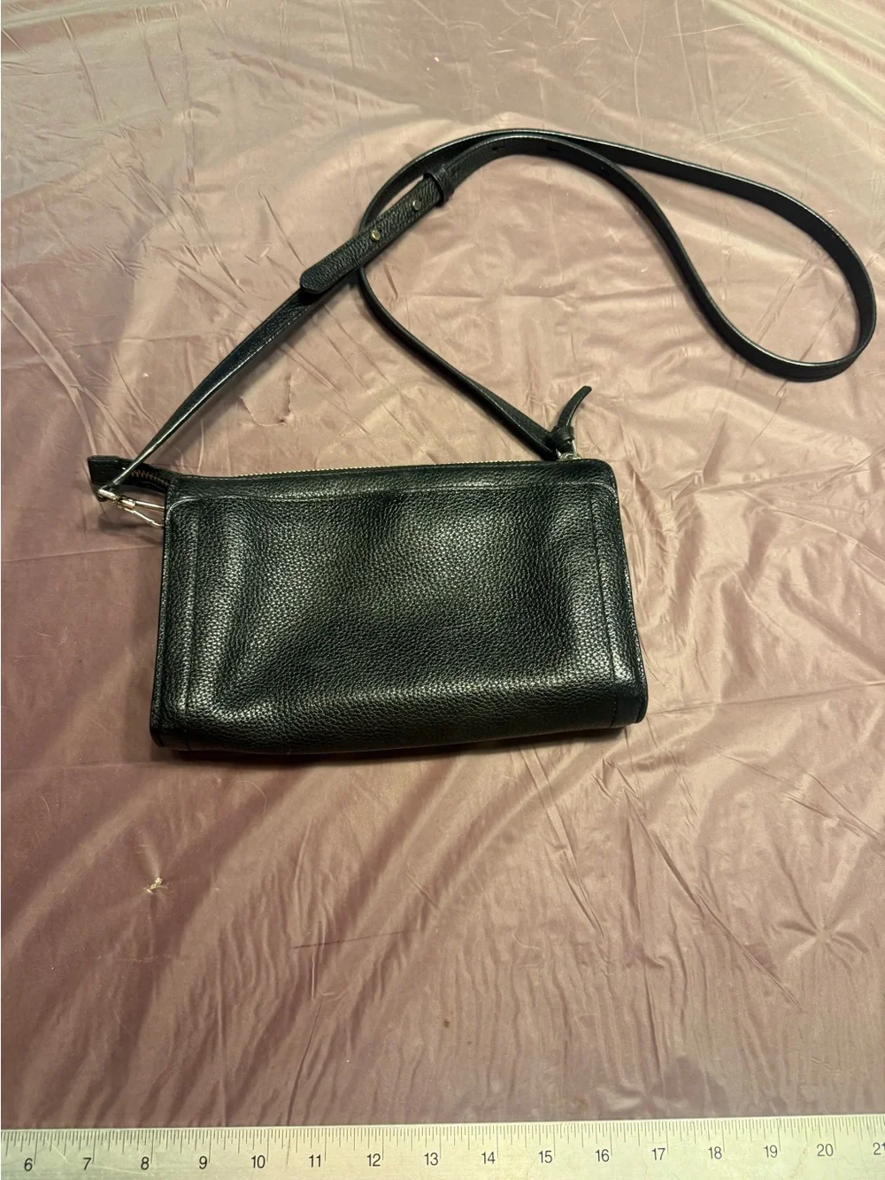 Kate Spade Knott small crossbody clutch in black pebbled leather